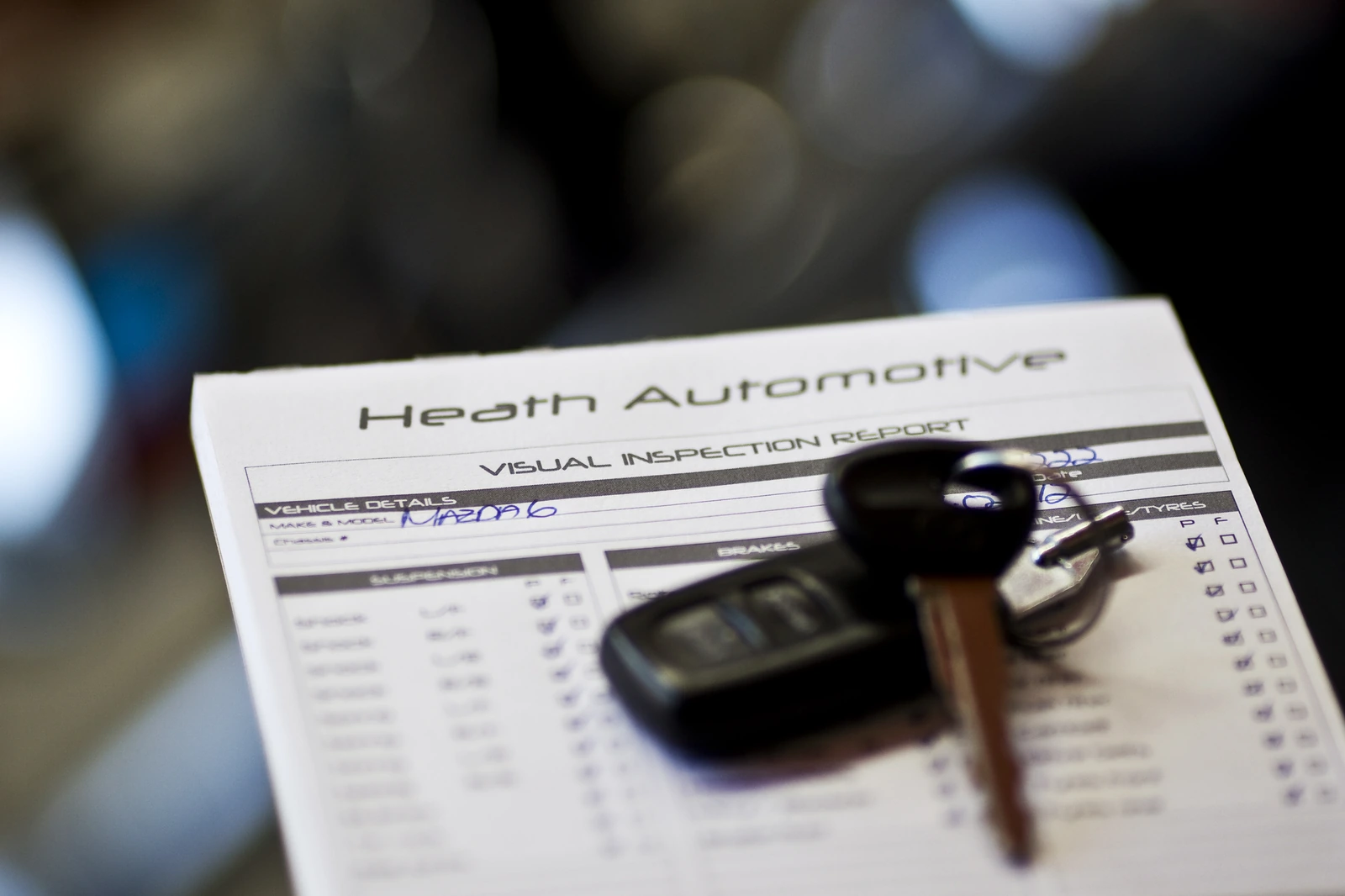 Car key on a Heath Automotive visual inspection report